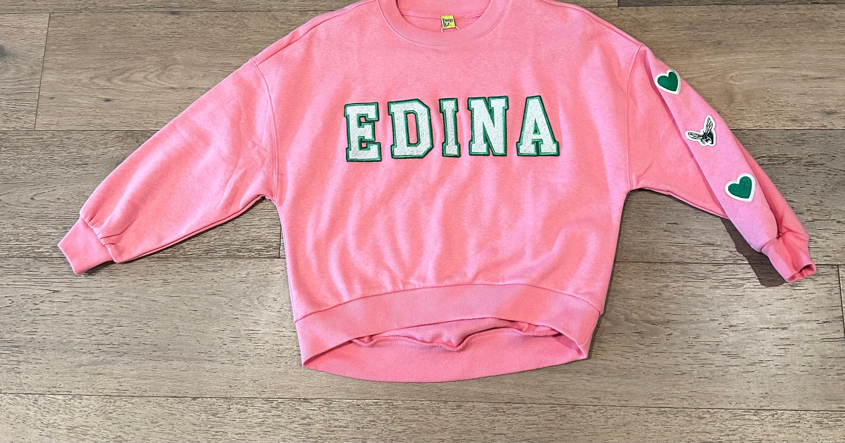 Edina Youth Pink hi-lo crew